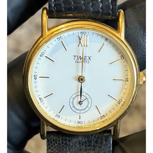 VTG Timex T Cell Quartz Gold Case Black Leather Band Water Resistant Watch WMN